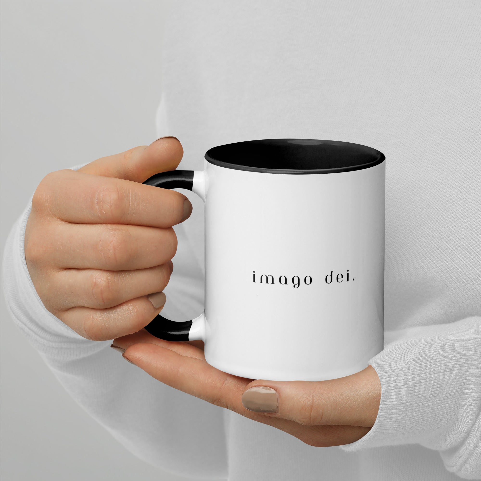 http://shopapologia.com/cdn/shop/files/white-ceramic-mug-with-color-inside-black-11oz-left-6488a2db708df.jpg?v=1686676196